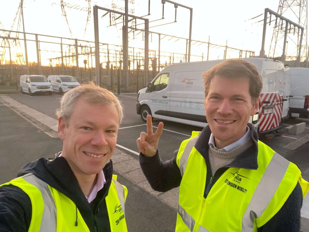 Selfie Nicolas and François in front of Elia electric vehicles